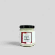 Load image into Gallery viewer, Lovers & Friends candle- This scent is reminiscent of laying in bed with your secret lover with the smell of jasmine, cocoa butter, sandalwood and musk intertwined in tousled sheets.