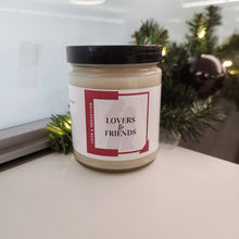 Load image into Gallery viewer, Lovers & Friends candle- This scent is reminiscent of laying in bed with your secret lover with the smell of jasmine, cocoa butter, sandalwood and musk intertwined in tousled sheets.