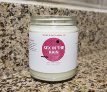 Load image into Gallery viewer, Sex In The Rain Candle- This scent of lily, rose petals, jasmine &amp; lavender swirl in the breeze.