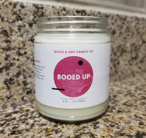 Booed Up Candle-Grin away while indulging in seductive scent of dark chocolate, cedar, & suede.